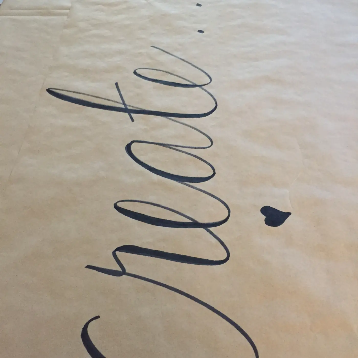 The word create written in calligraphy