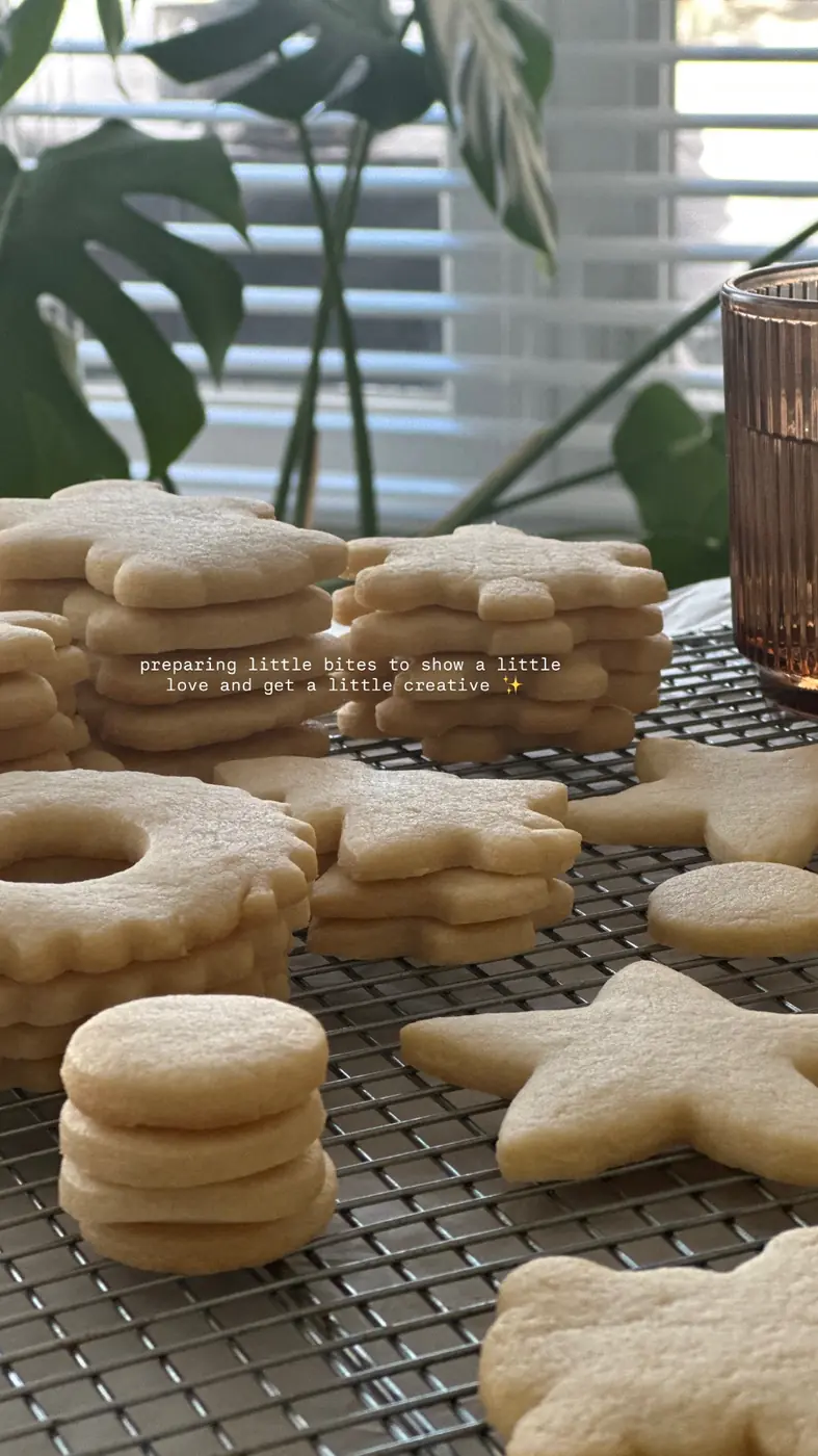 Freshly baked sugar cookies cooling on a rack