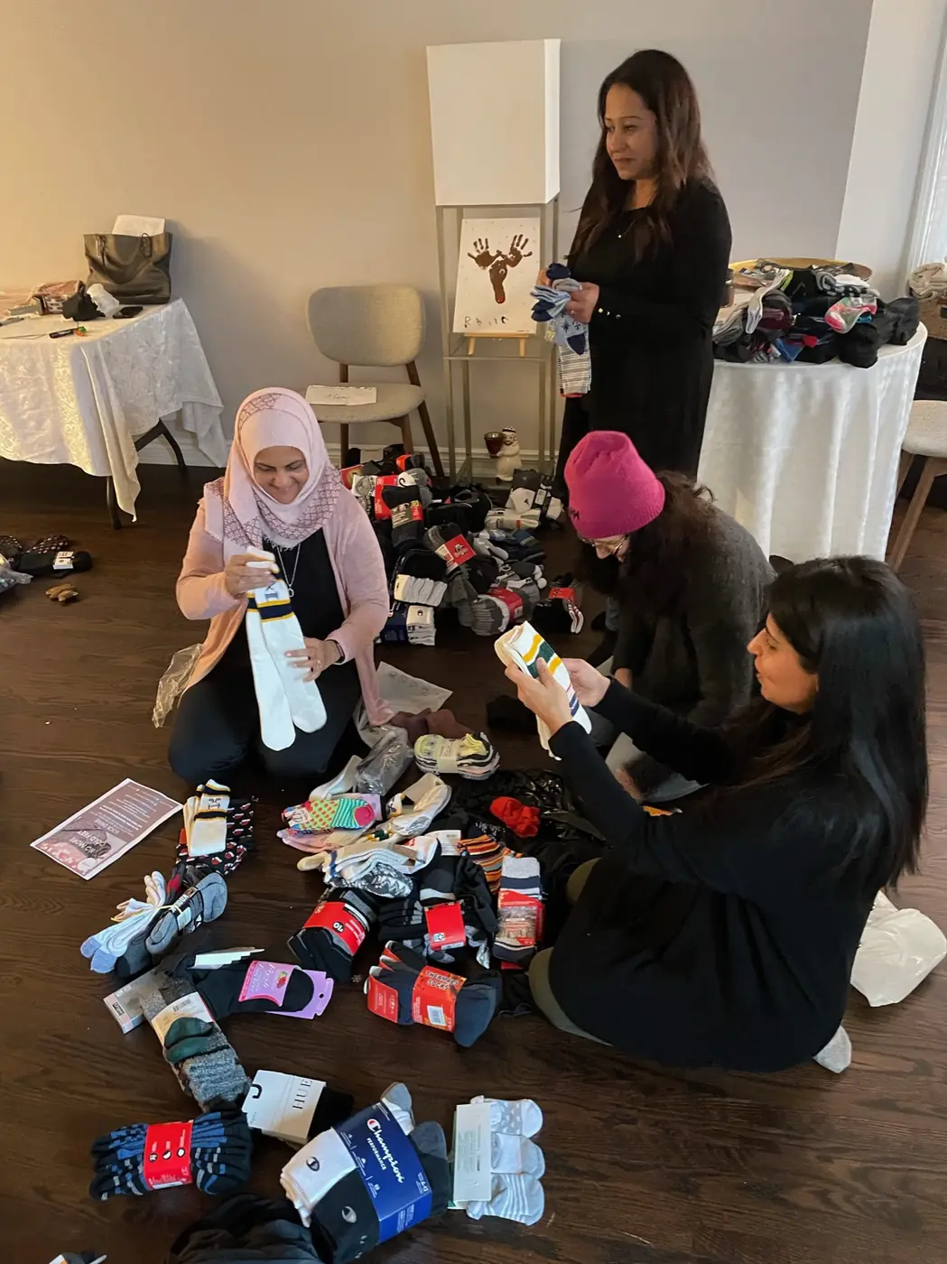 Volunteers sorting donated socks